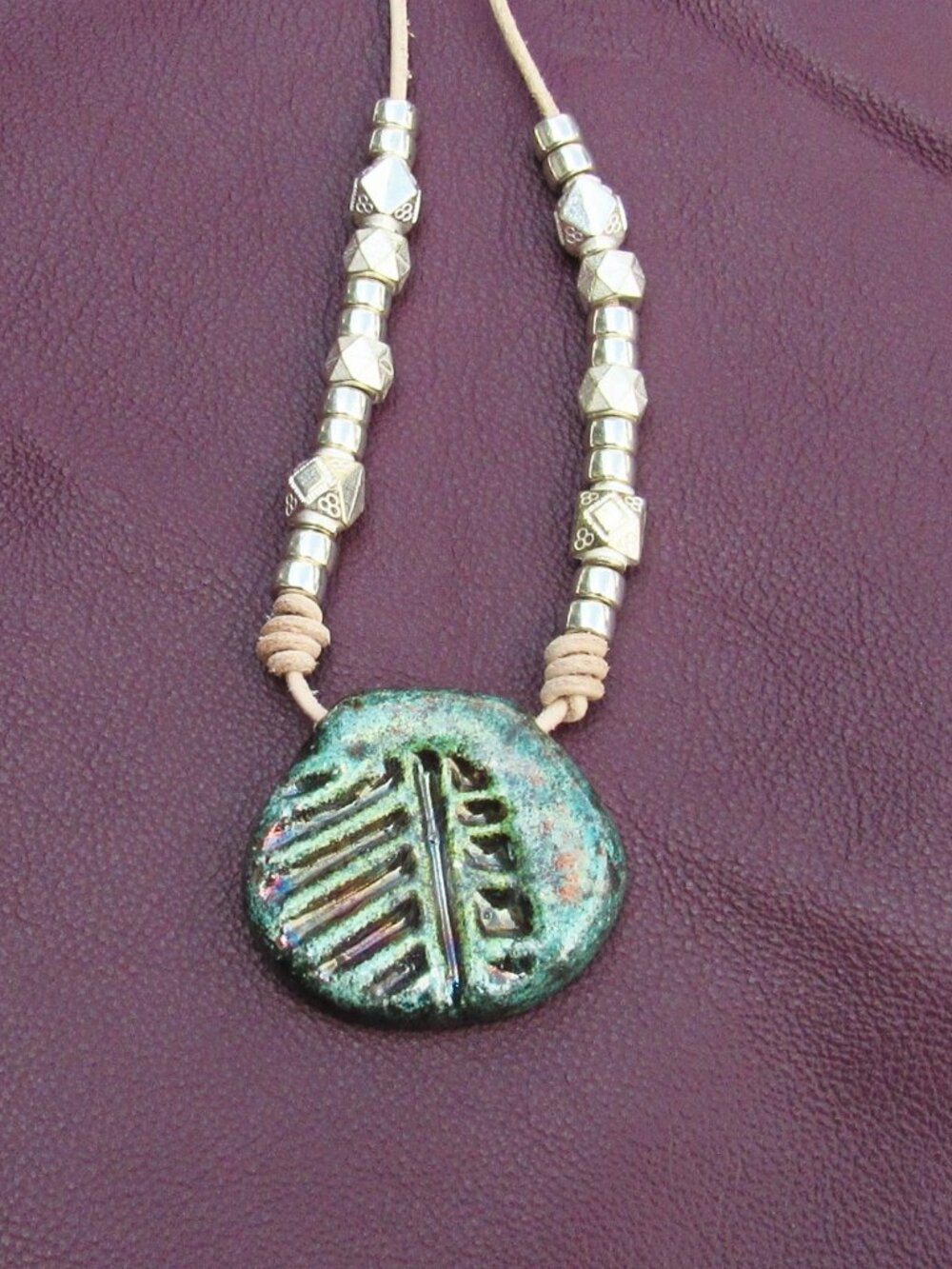 31 inches Leather Necklace with Blue Green Pottery Fossil Pendant, Silver Beads
